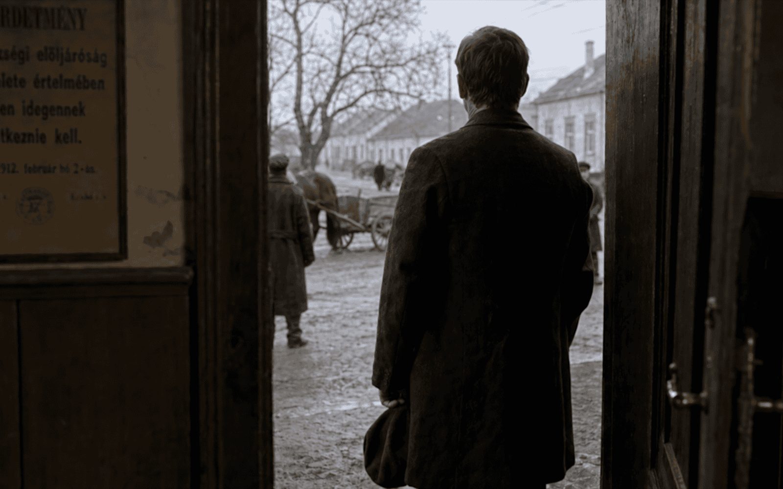 Jozef steps out the door to leave for America, a still from a real Vida Colorado legacy film.